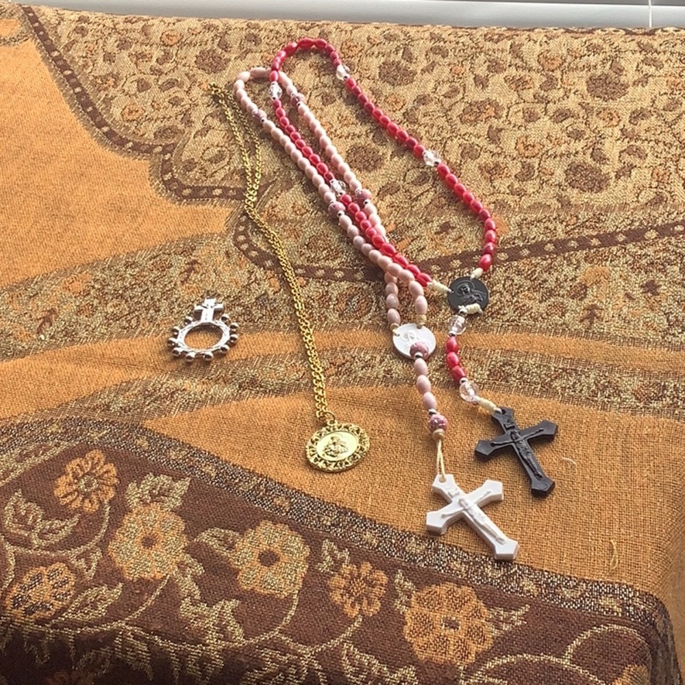 Religious items 2 beaded necklaces one gold costume necklace one other